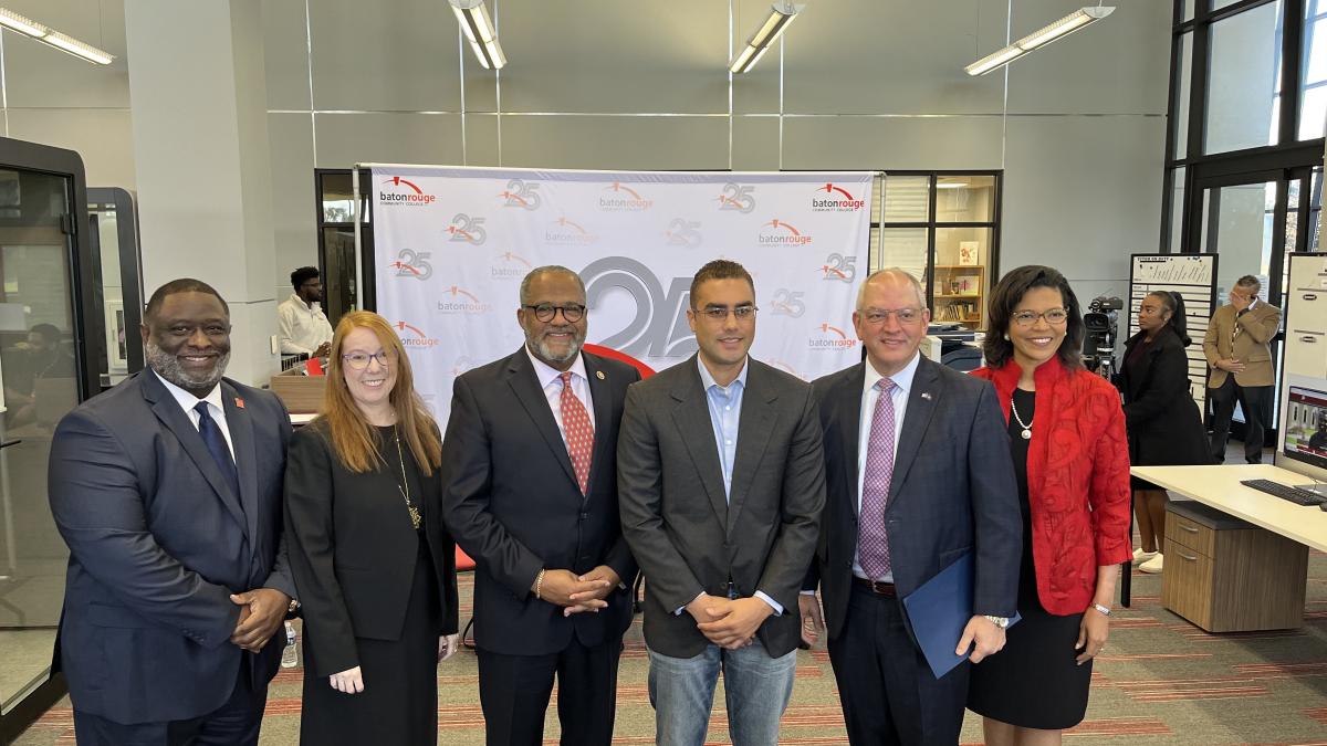 From left to right: Dr. Willie E. Smith, Susie Schowen, Congressman Troy A. Carter, Sr., Robert Davis, Governor John Bel Edwards, Kim Hunter Reed, Ph.D.